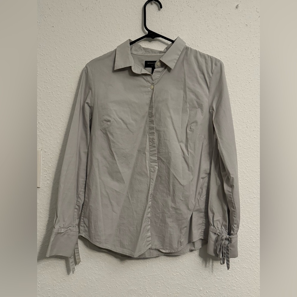 Lightly worn tailored dress shit with ribbon sleeves